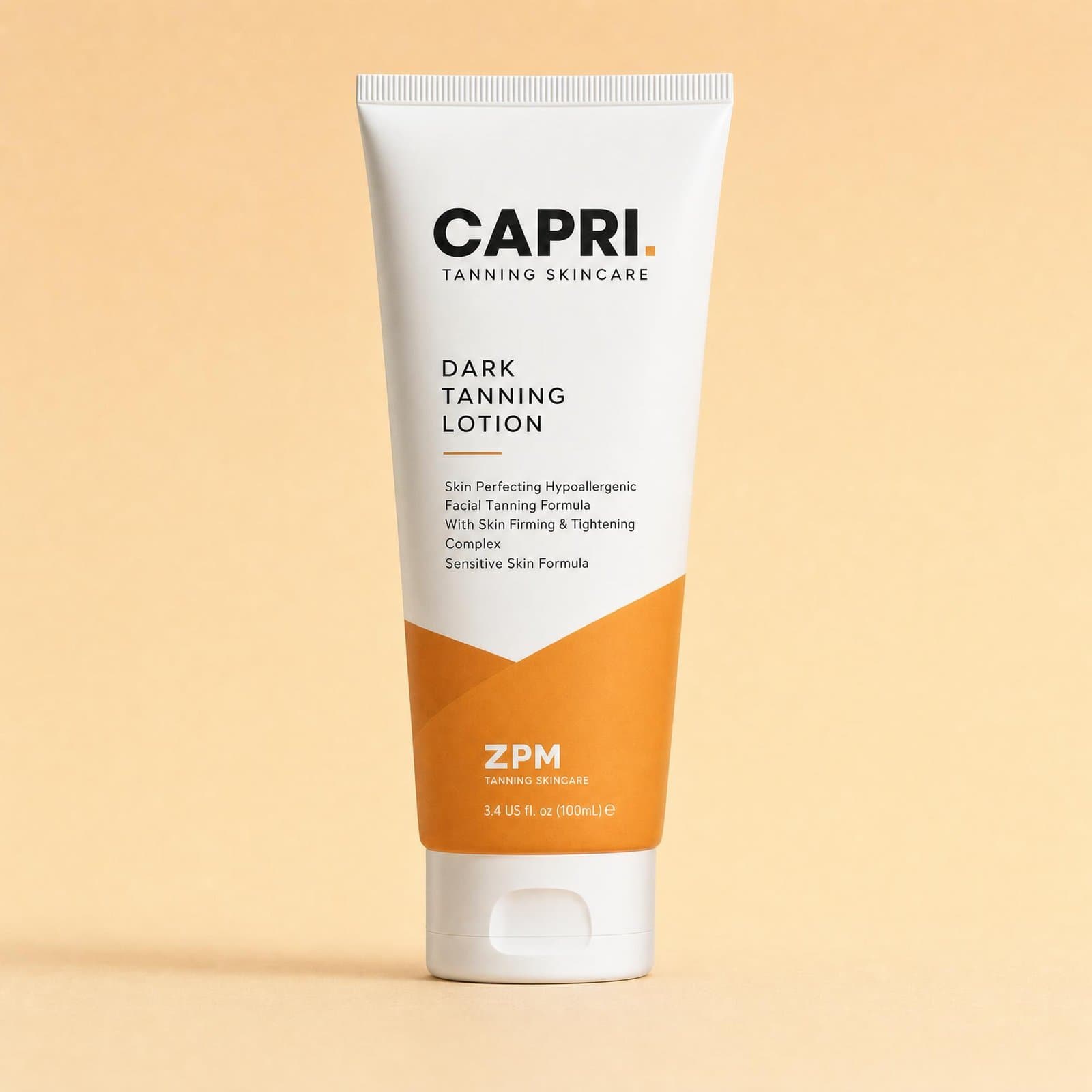 Capri Glow Accelerator tanning lotion tube on peach